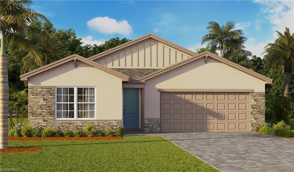 17752 Shade Tree Loop Punta Gorda, FL 33982 - Photo 1 of 40 View of front of property featuring stone siding, decorative driveway, a front yard, and an attached garage
