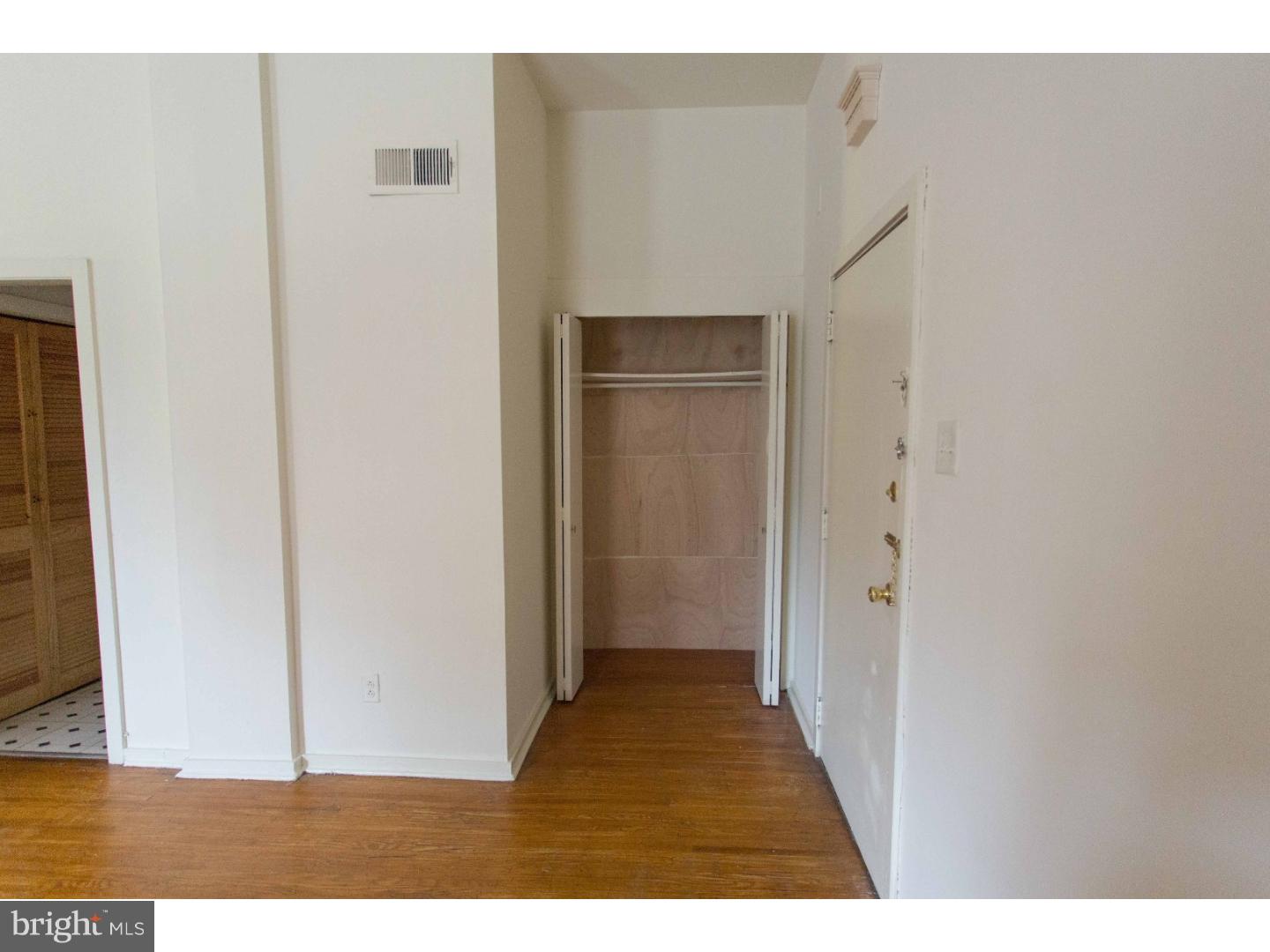 407 South 11th Street, Unit 3F Philadelphia, PA 19147 - Photo 10 of 14 a view of a room with wooden floor