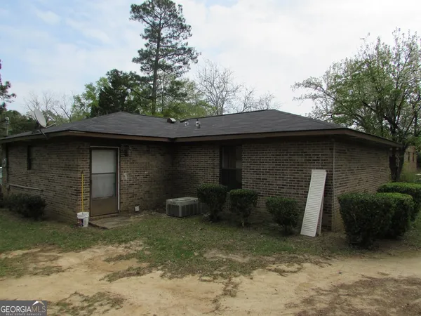 a front view of a house with garage