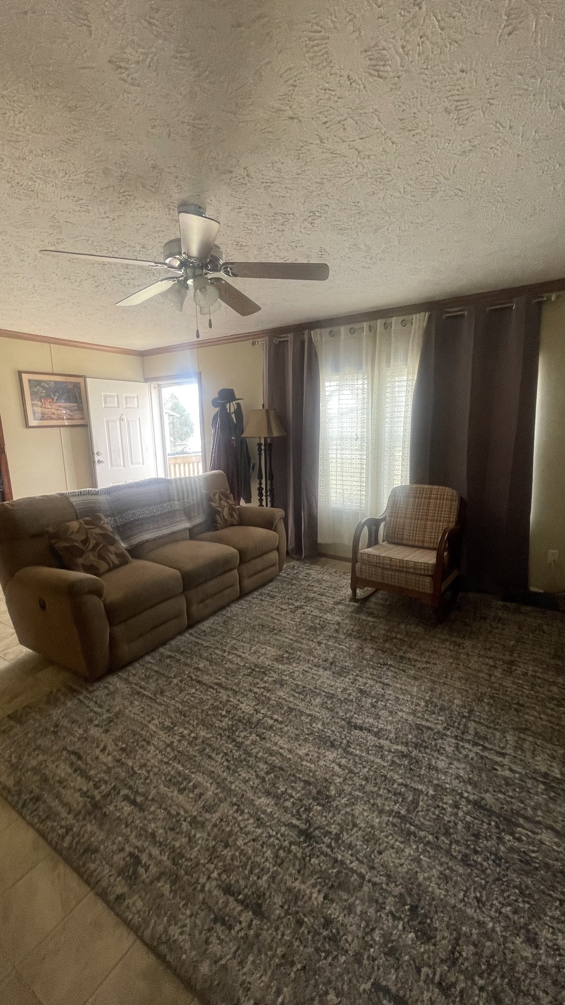 75 Snell Road Ethridge, TN 38456 - Photo 11 of 51 a living room with furniture and a chandelier