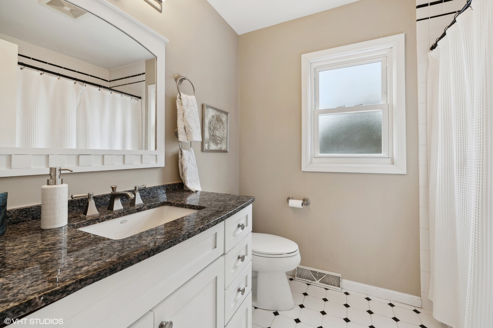 482 Uvedale Road Riverside, IL 60546 - Photo 23 of 29 a bathroom with a granite countertop sink a mirror and a toilet
