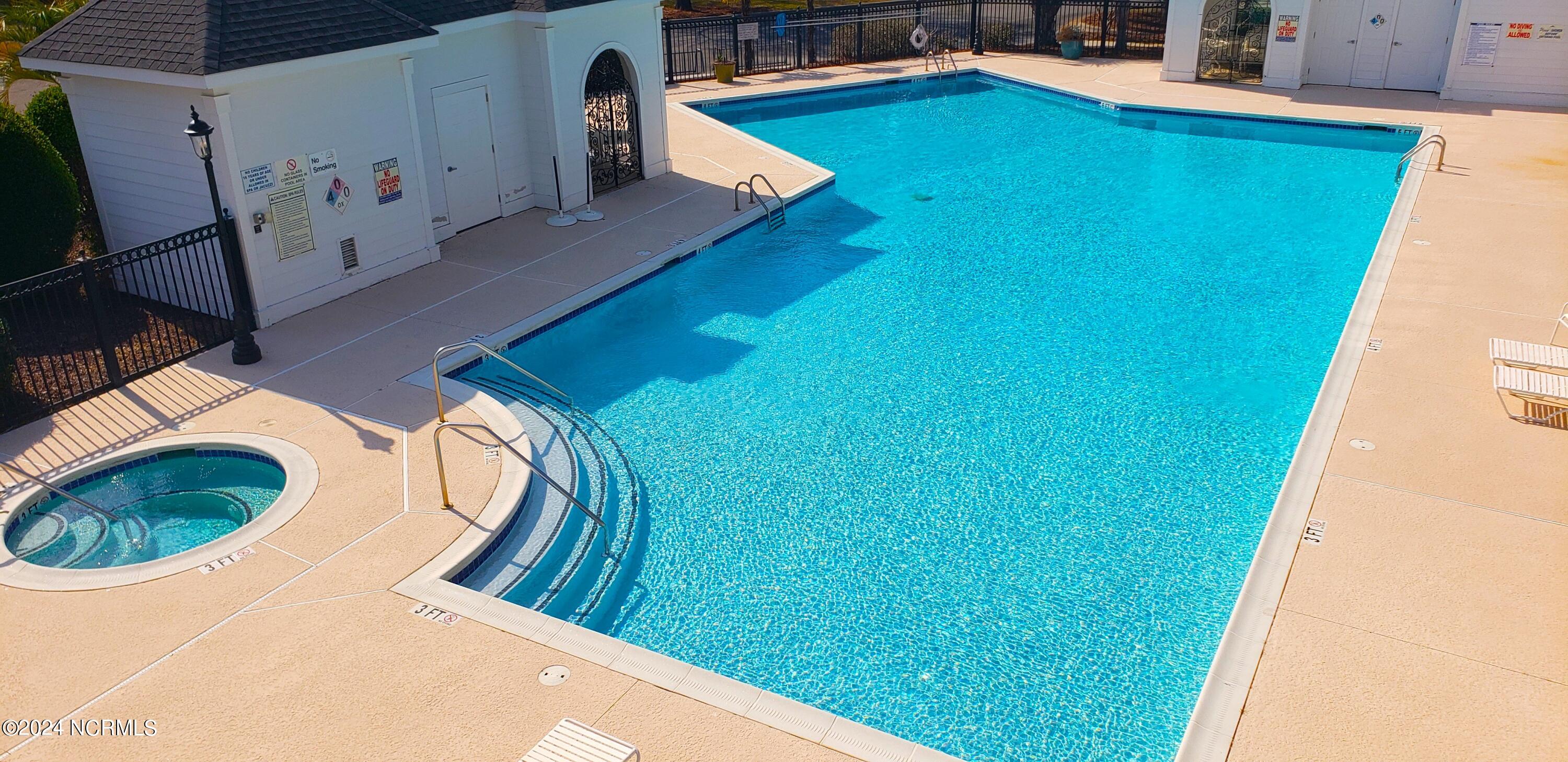 627 Valverda Street Southwest Supply, NC 28462 - Photo 5 of 14 Outdoor Pool & Jacuzzi