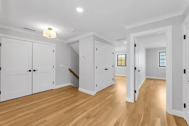 a view of a room with window and stairs