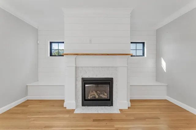a living room with a fireplace