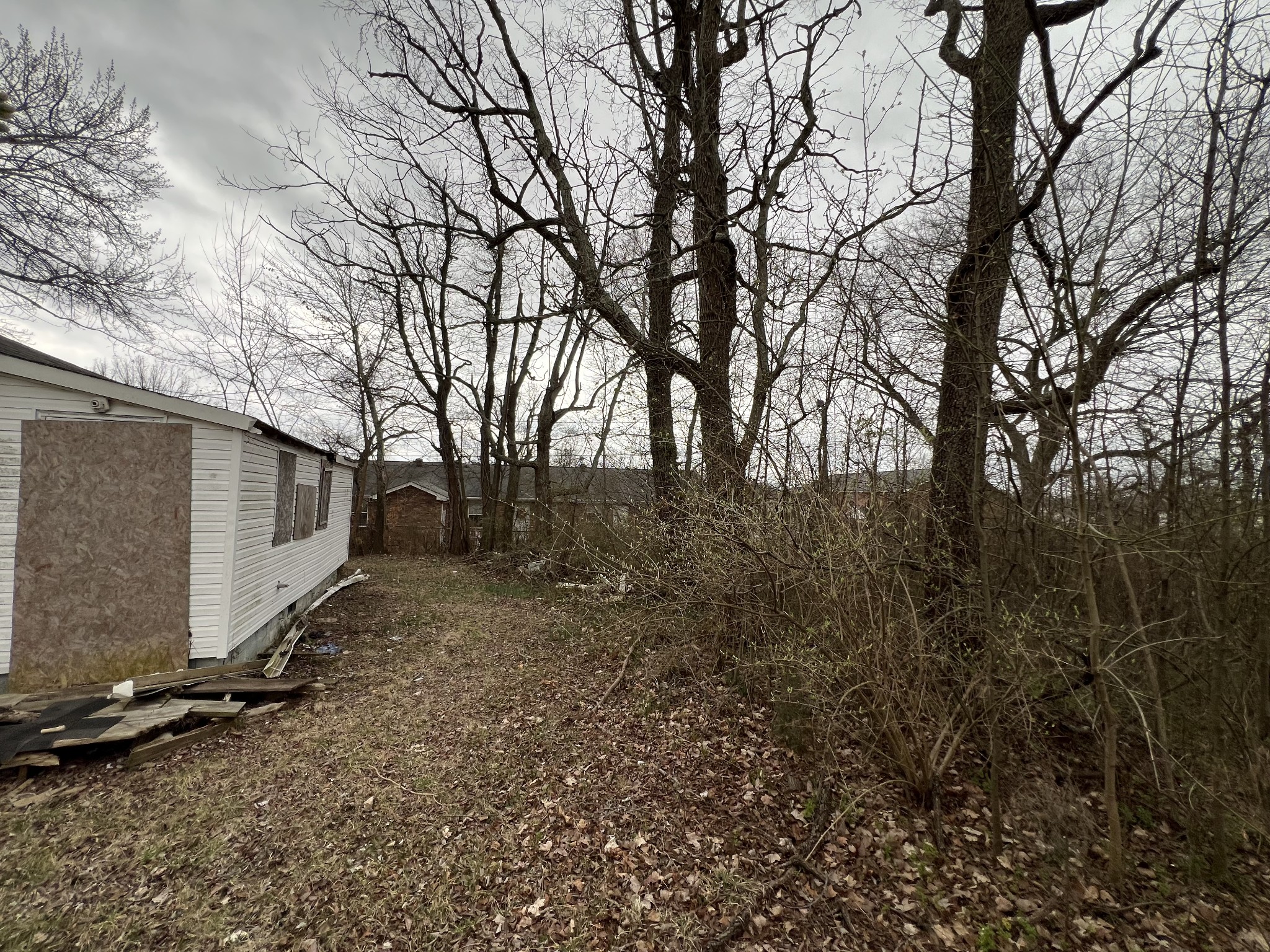 896 Peachers Mill Road Clarksville, TN 37042 - Photo 5 of 7 a backyard of a house with lots of green space