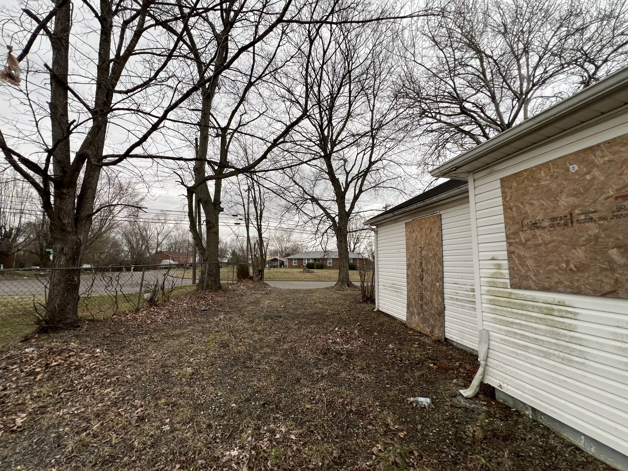 896 Peachers Mill Road Clarksville, TN 37042 - Photo 6 of 7 a backyard of a house with lots of green space