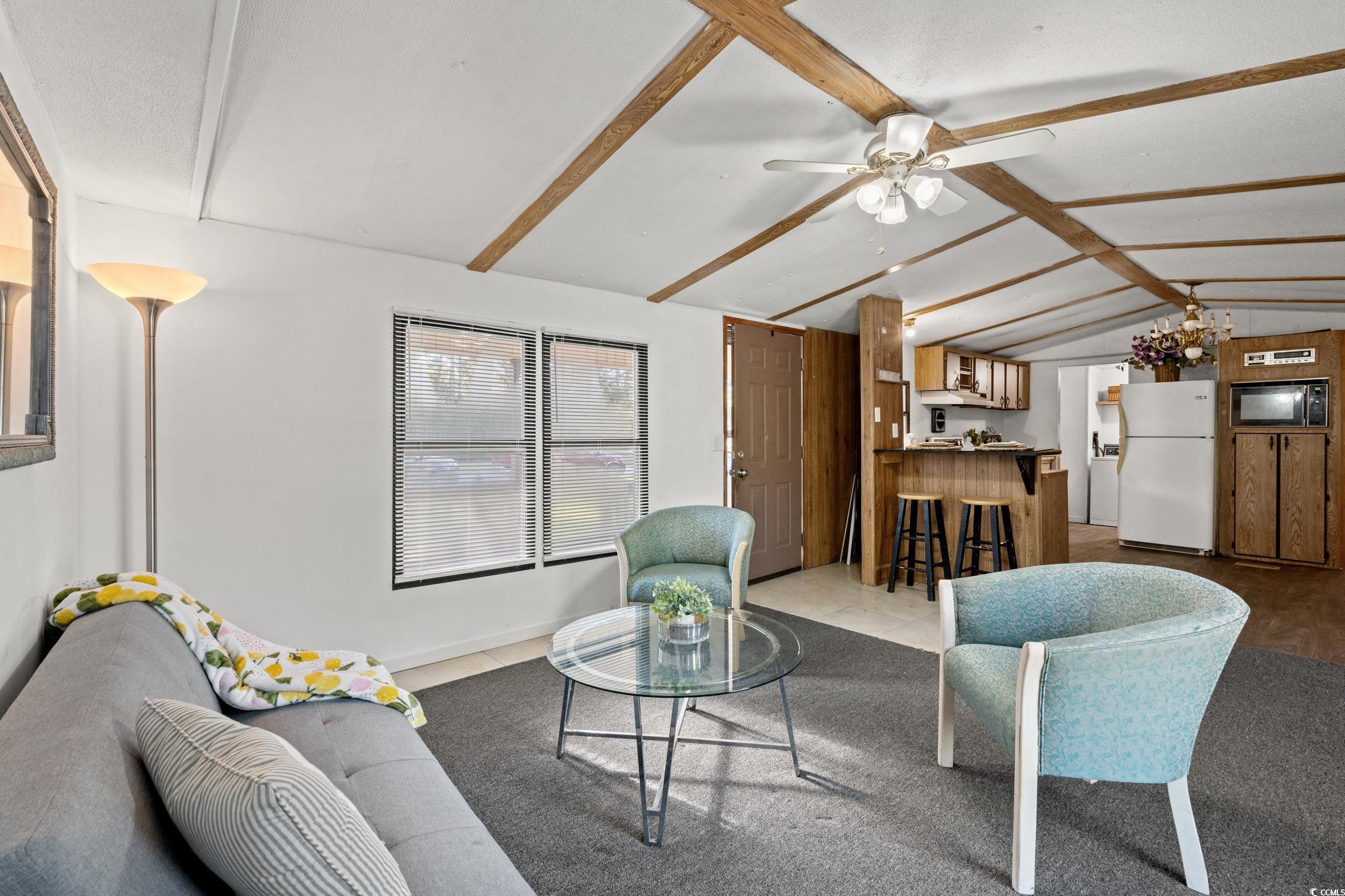 149 William Street Loris, SC 29569 - Photo 14 of 40 Living room with ceiling fan