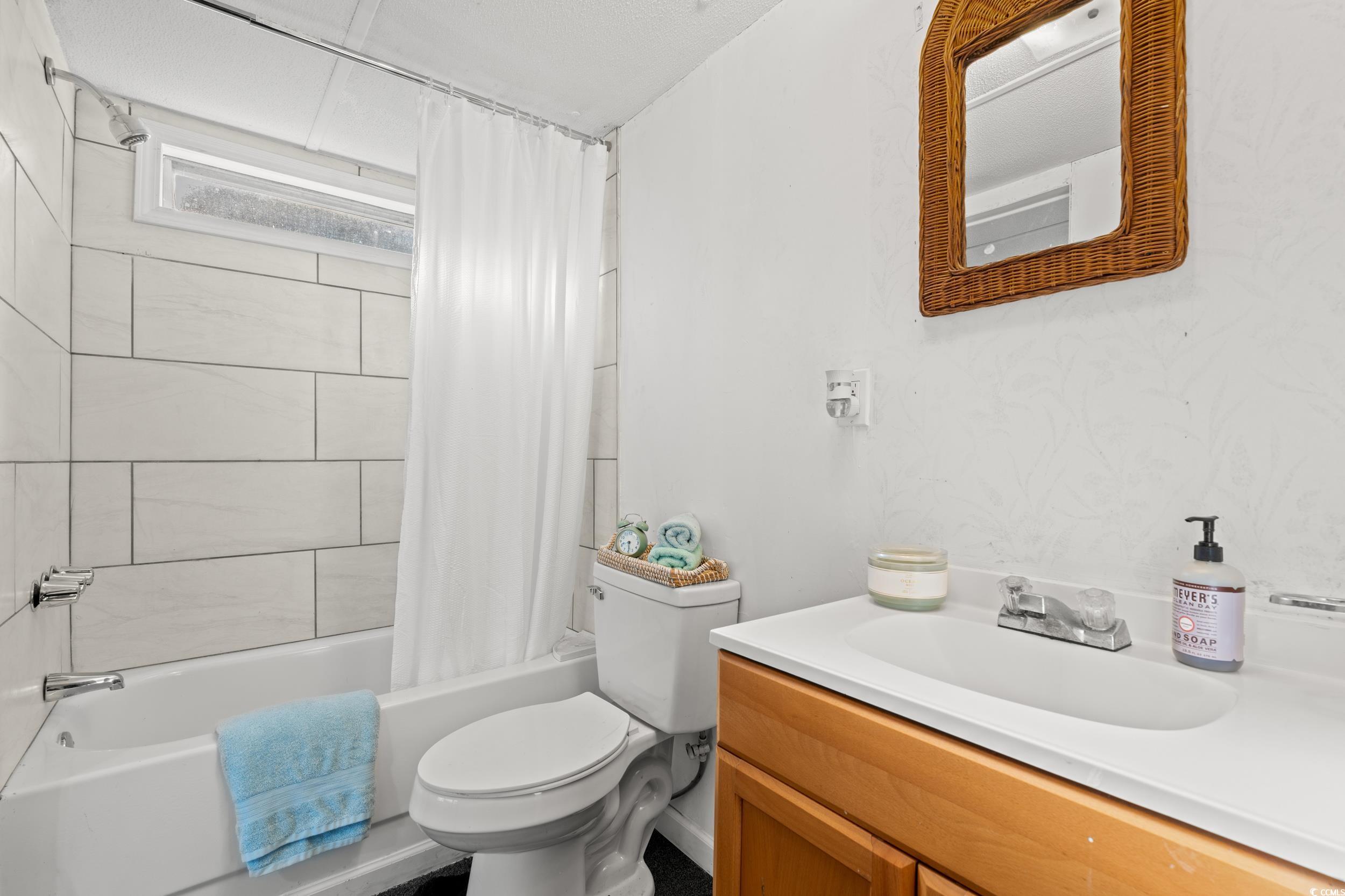 149 William Street Loris, SC 29569 - Photo 27 of 40 Bathroom featuring vanity and shower / bath combo