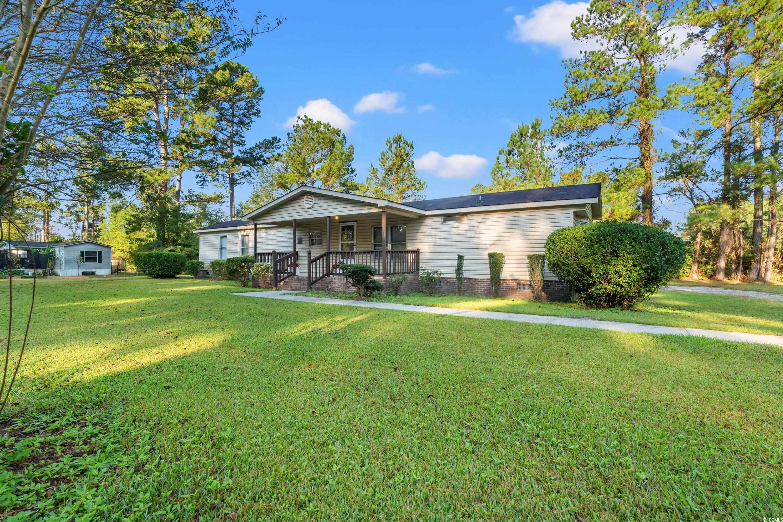 149 William Street Loris, SC 29569 - Photo 36 of 40 Single story home with a front lawn, a porch, an outbuilding, and crawl space