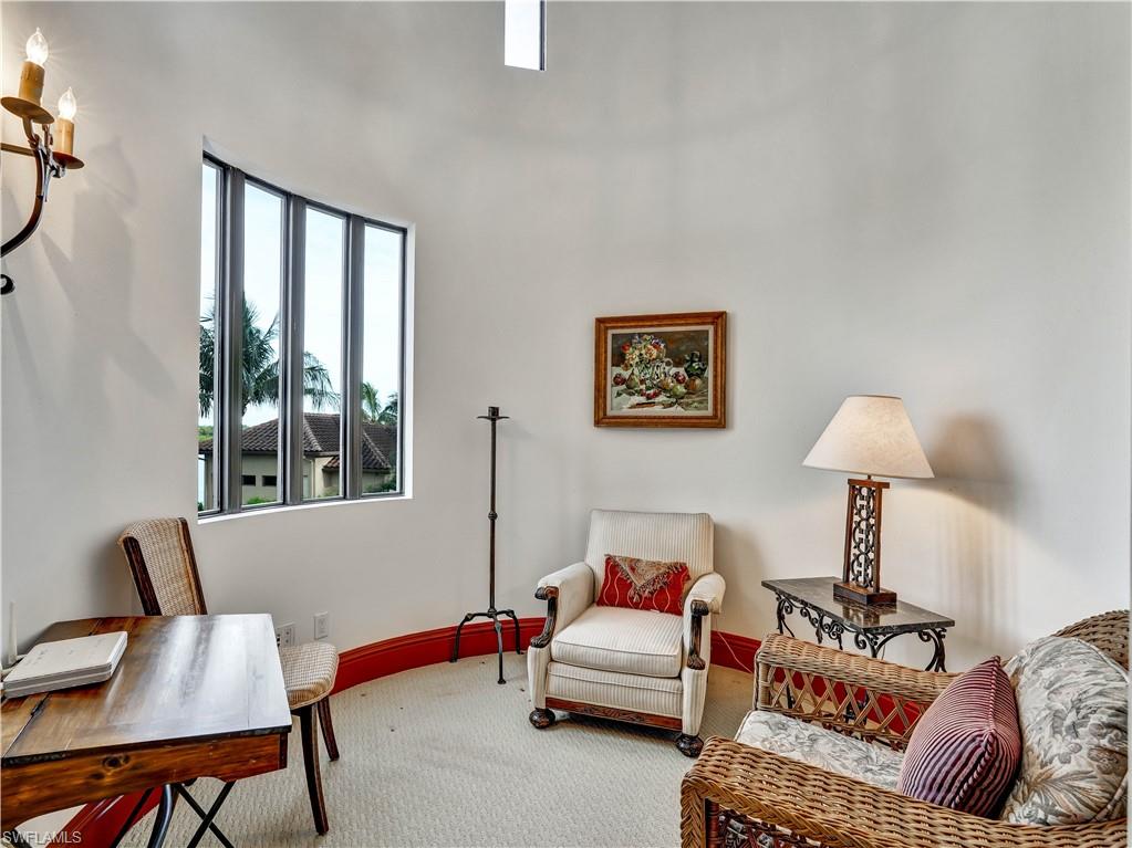 2535 Tarpon Road Naples, FL 34102 - Photo 29 of 50 Bedroom featuring a window with exterior landscaping, a ceiling fan, and carpeted flooring