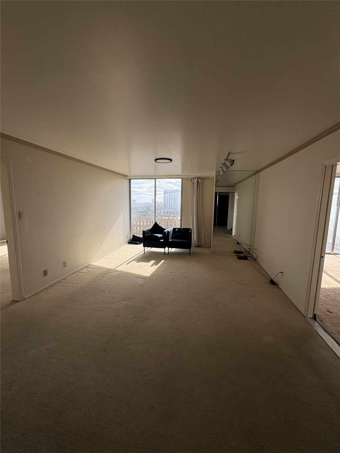 2016 Main Street, Unit 1620 Houston, TX 77002 - Photo 3 of 12 a view of a big room with closet area