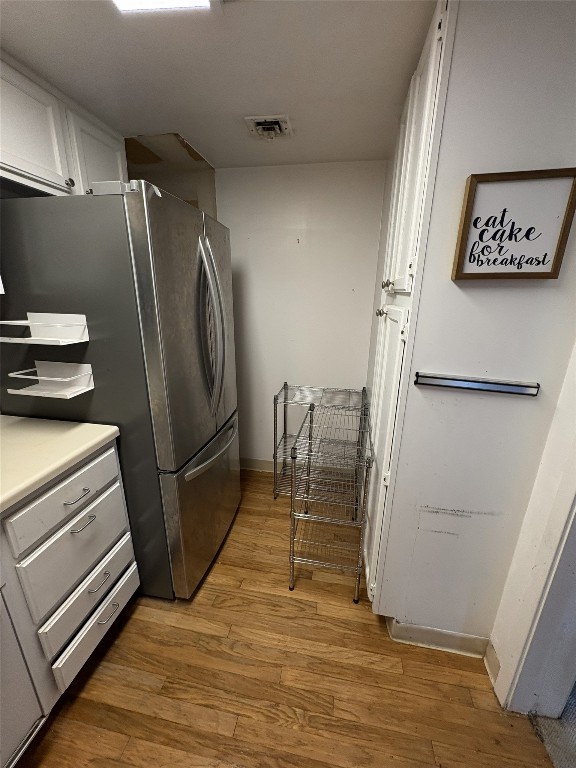 2016 Main Street, Unit 1620 Houston, TX 77002 - Photo 6 of 13 a view of a refrigerator in kitchen and an empty room
