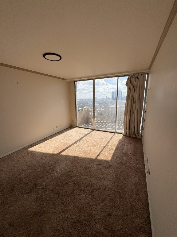 2016 Main Street, Unit 1620 Houston, TX 77002 - Photo 9 of 13 an empty room with wooden floor and windows