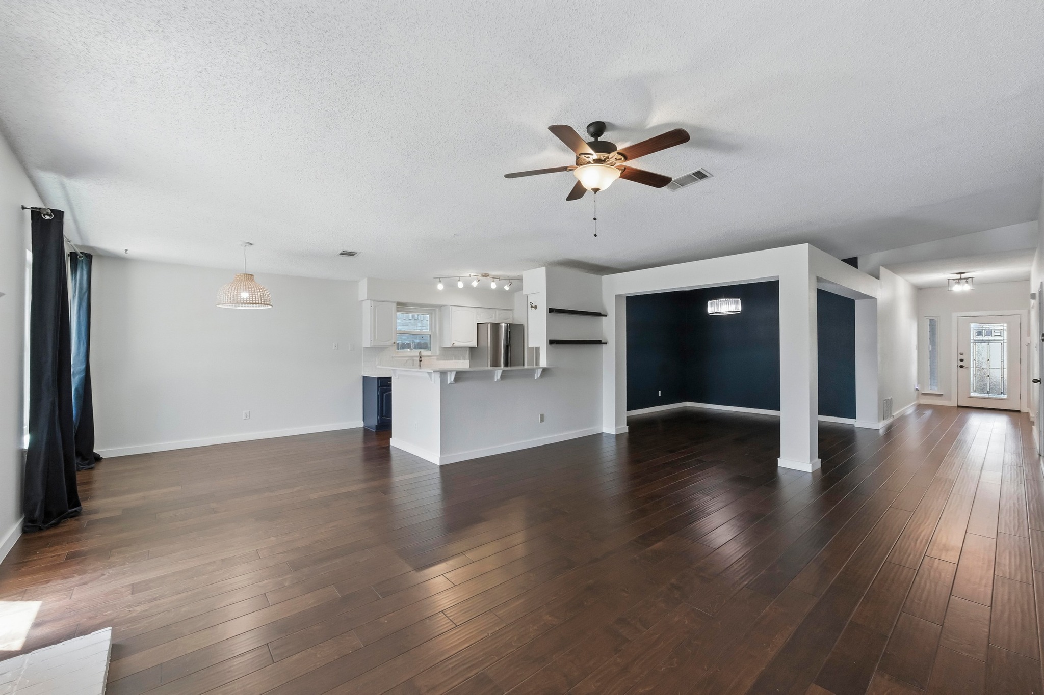 8809 Ravello Pass Austin, TX 78749 - Photo 1 of 1 Spacious living and dining rooms with abundant natural light.