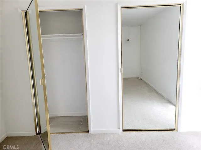 an empty room with closet