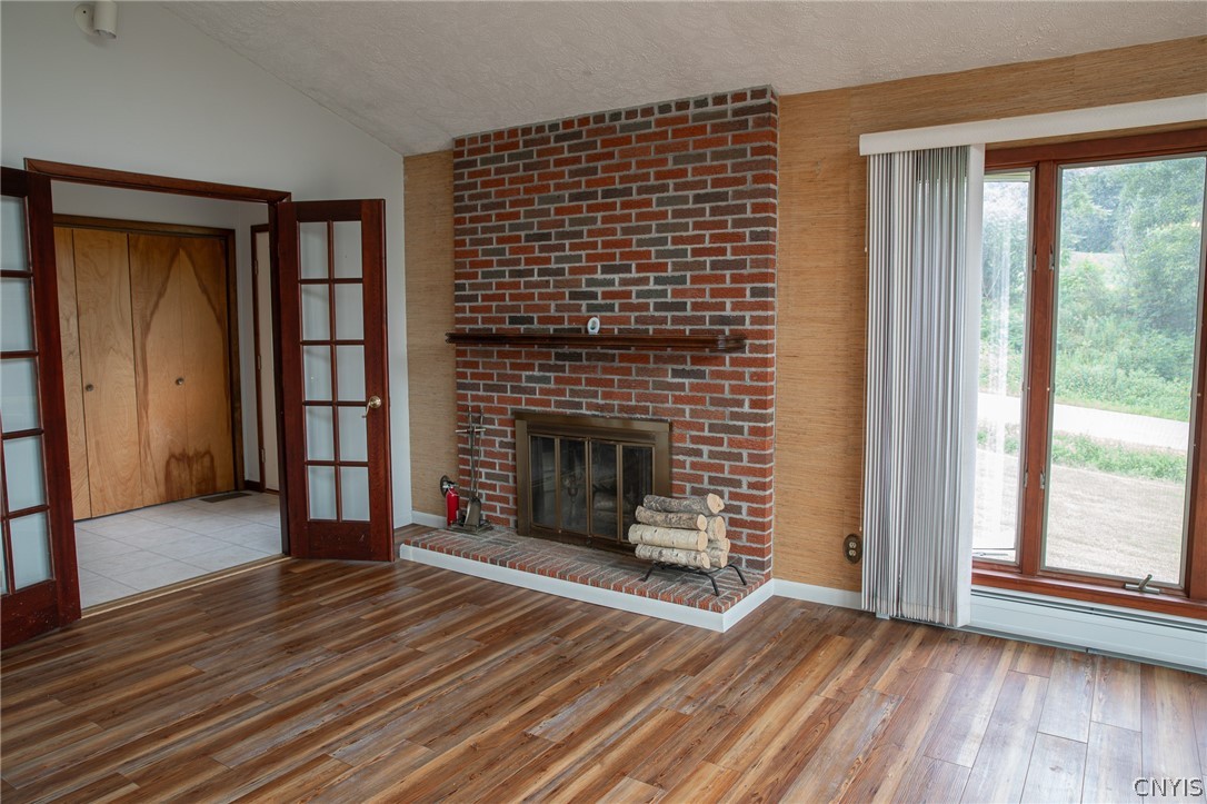 671 Goodrich Hill Road Locke, NY 13092 - Photo 7 of 37 Woodburning fireplace is capped
