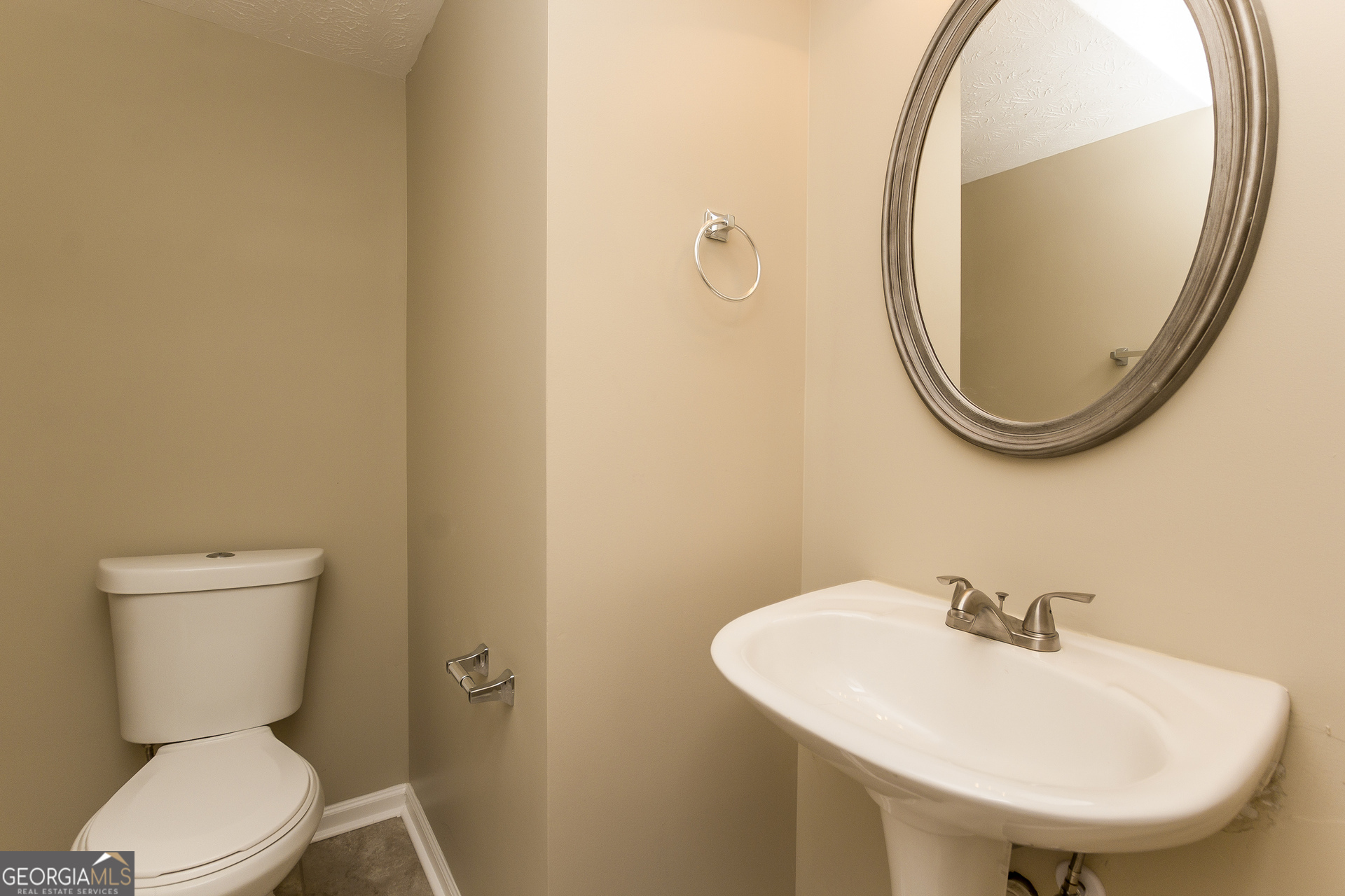 7287 Walton Hill Fairburn, GA 30213 - Photo 14 of 15 a bathroom with a sink and a mirror