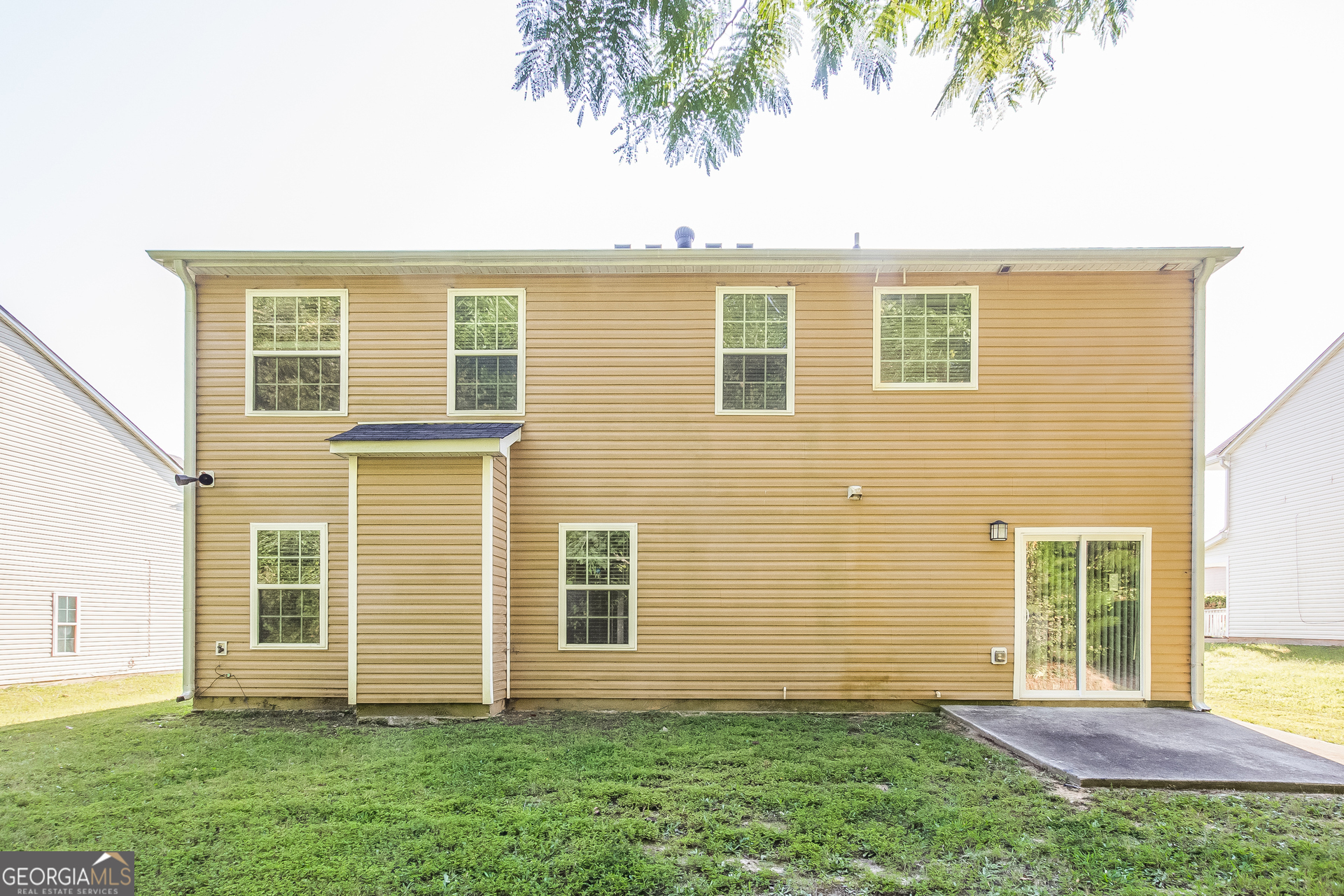 7287 Walton Hill Fairburn, GA 30213 - Photo 15 of 15 front view of a house with a yard
