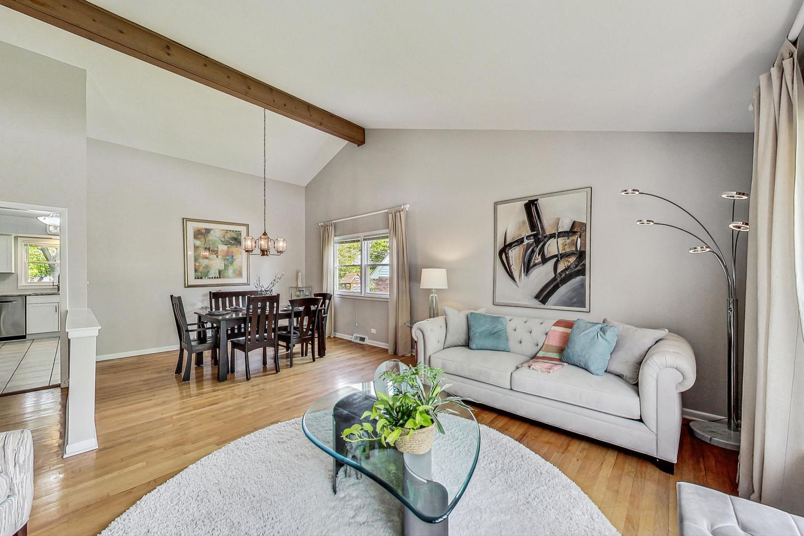 910 Whitegate Drive Mount Prospect, IL 60056 - Photo 8 of 38 a living room with furniture and wooden floor