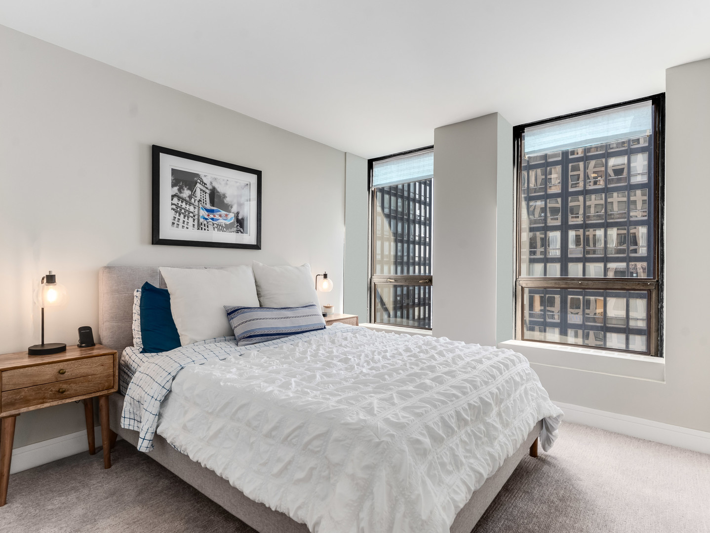 260 East Chestnut Street, Unit 1212 Chicago, IL 60611 - Photo 14 of 30 a bedroom with double bed and a window