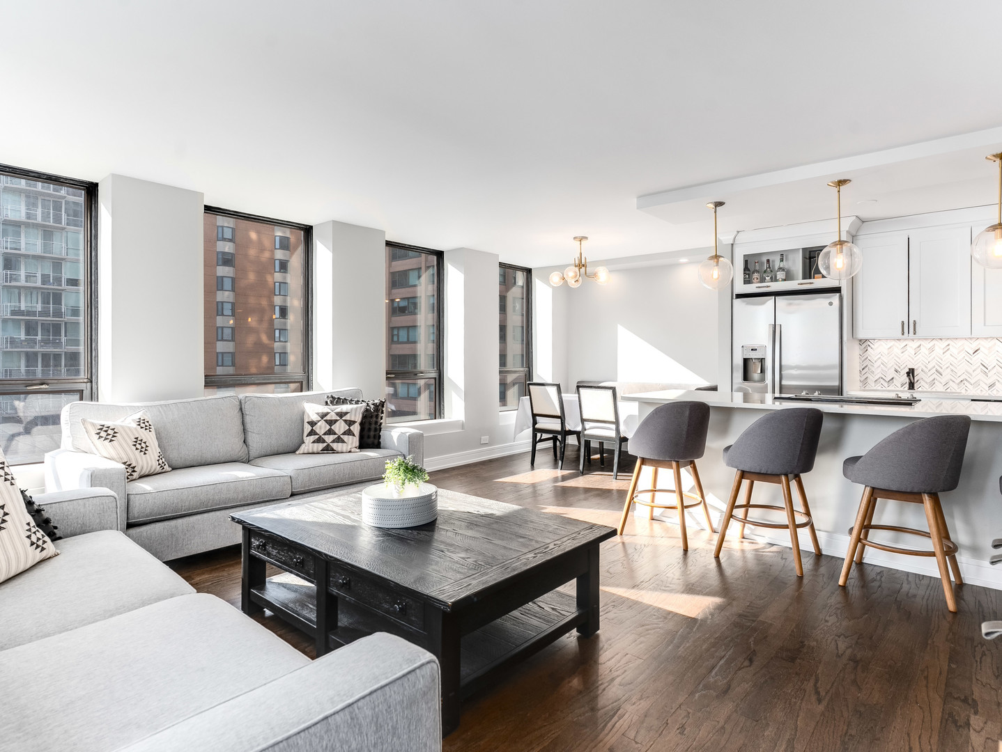 260 East Chestnut Street, Unit 1212 Chicago, IL 60611 - Photo 6 of 30 a living room with furniture and wooden floor