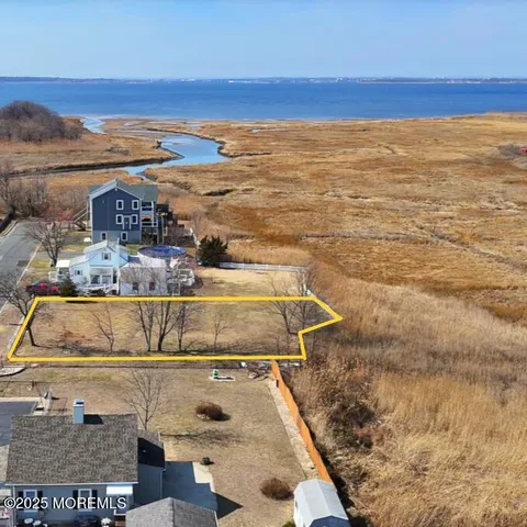 a view of a balcony with an ocean