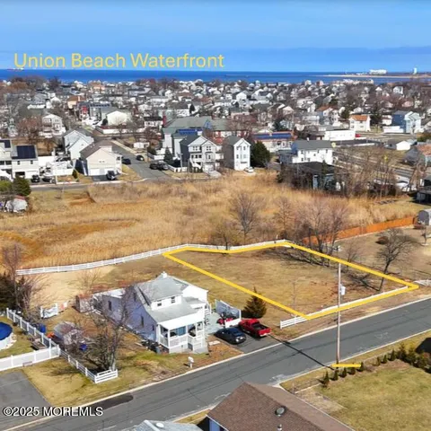 a view of a balcony with an ocean
