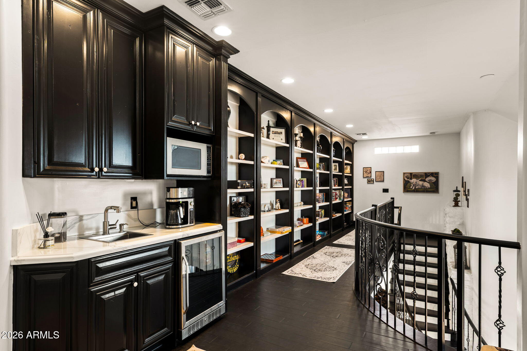 3446 East Knoll Street Mesa, AZ 85213 - Photo 10 of 23 UPSTAIRS HALL/BAR AREA