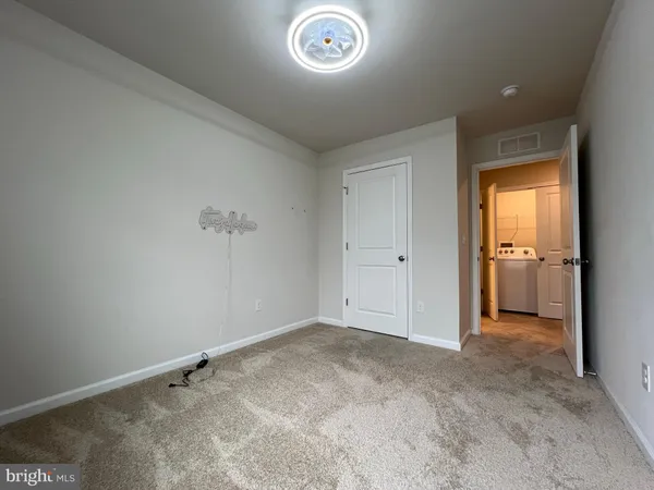 an empty room with a door