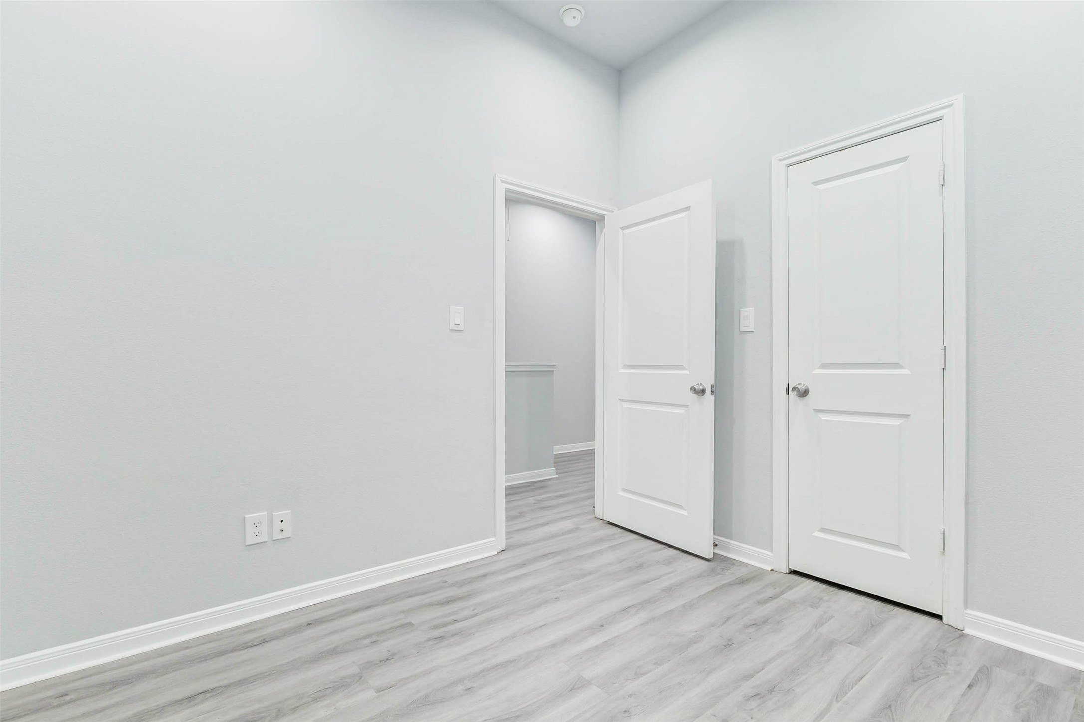 18835 Luminescent Ln Spring Spring, TX 77379 - Photo 17 of 28 a view of an empty room with wooden floor