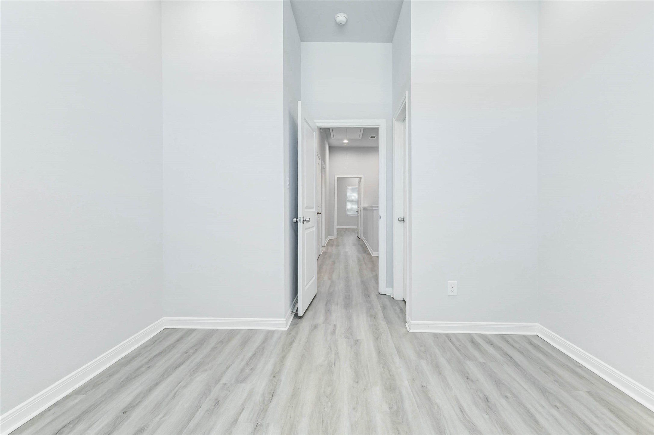 18835 Luminescent Ln Spring Spring, TX 77379 - Photo 21 of 28 a view of a room with wooden floor