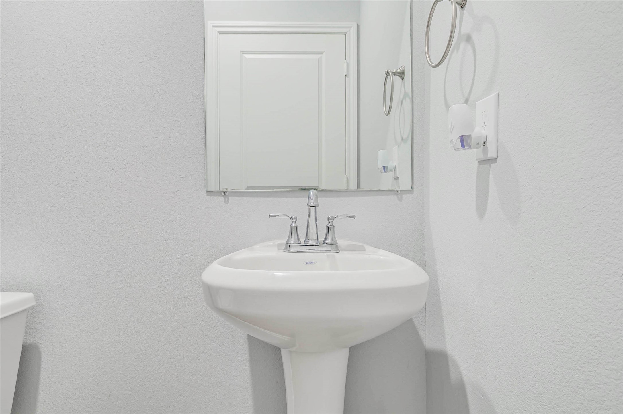 18835 Luminescent Ln Spring Spring, TX 77379 - Photo 25 of 28 a bathroom with a sink a mirror and shower
