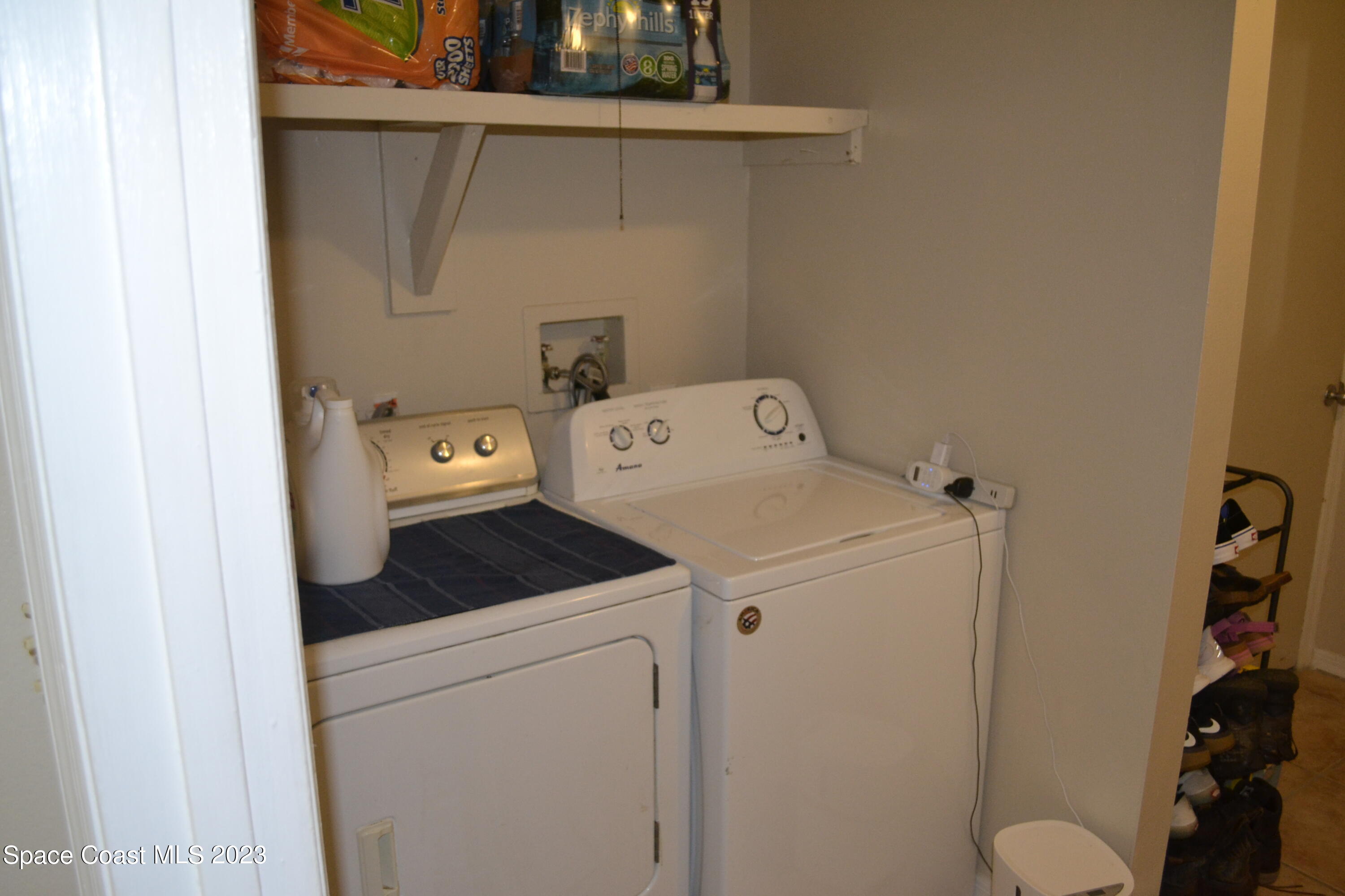 3910 Delespine Road Cocoa, FL 32927 - Photo 17 of 21 a utility room with dryer and washer