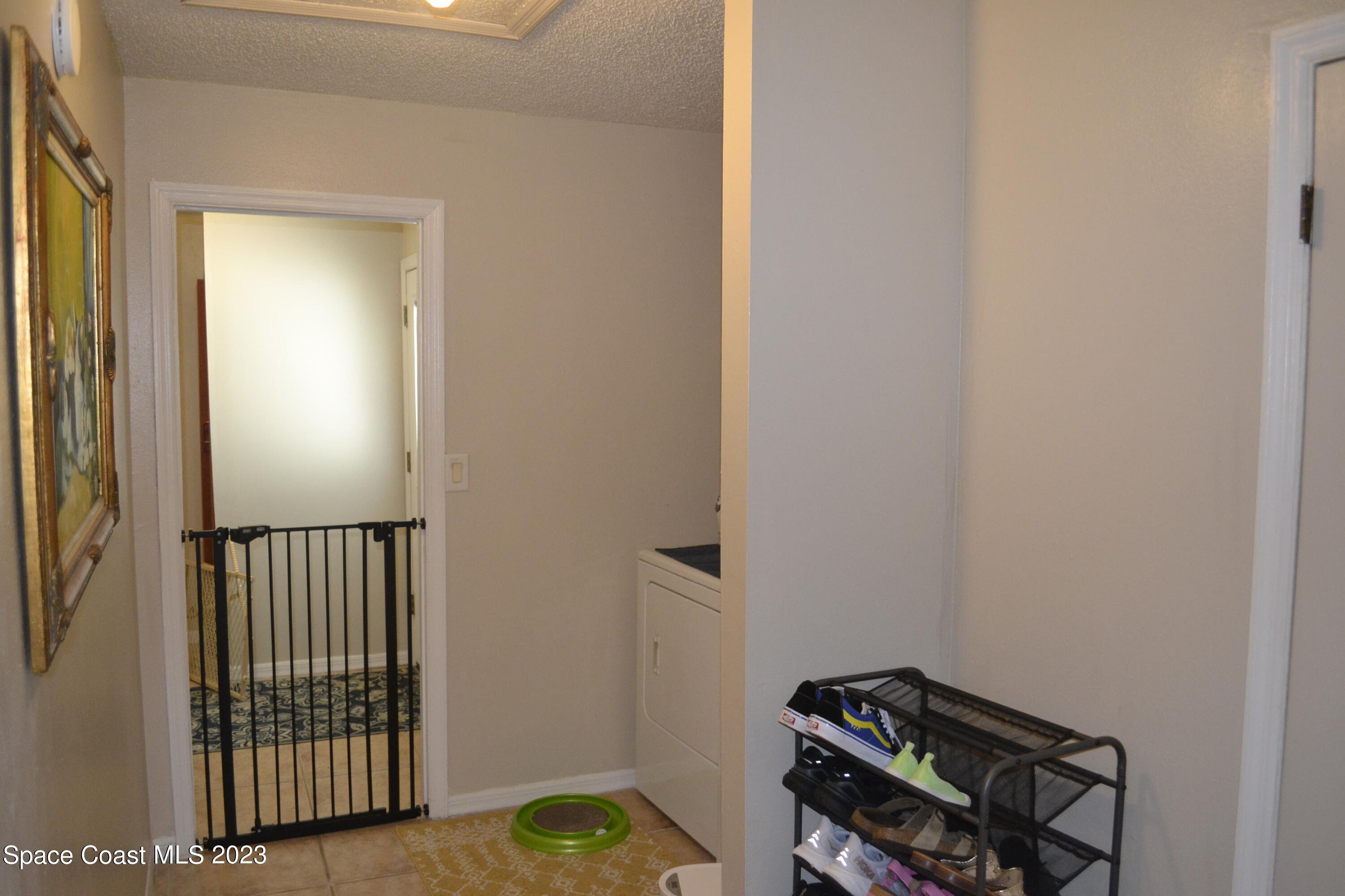 3910 Delespine Road Cocoa, FL 32927 - Photo 18 of 21 a view of a hallway with entryway