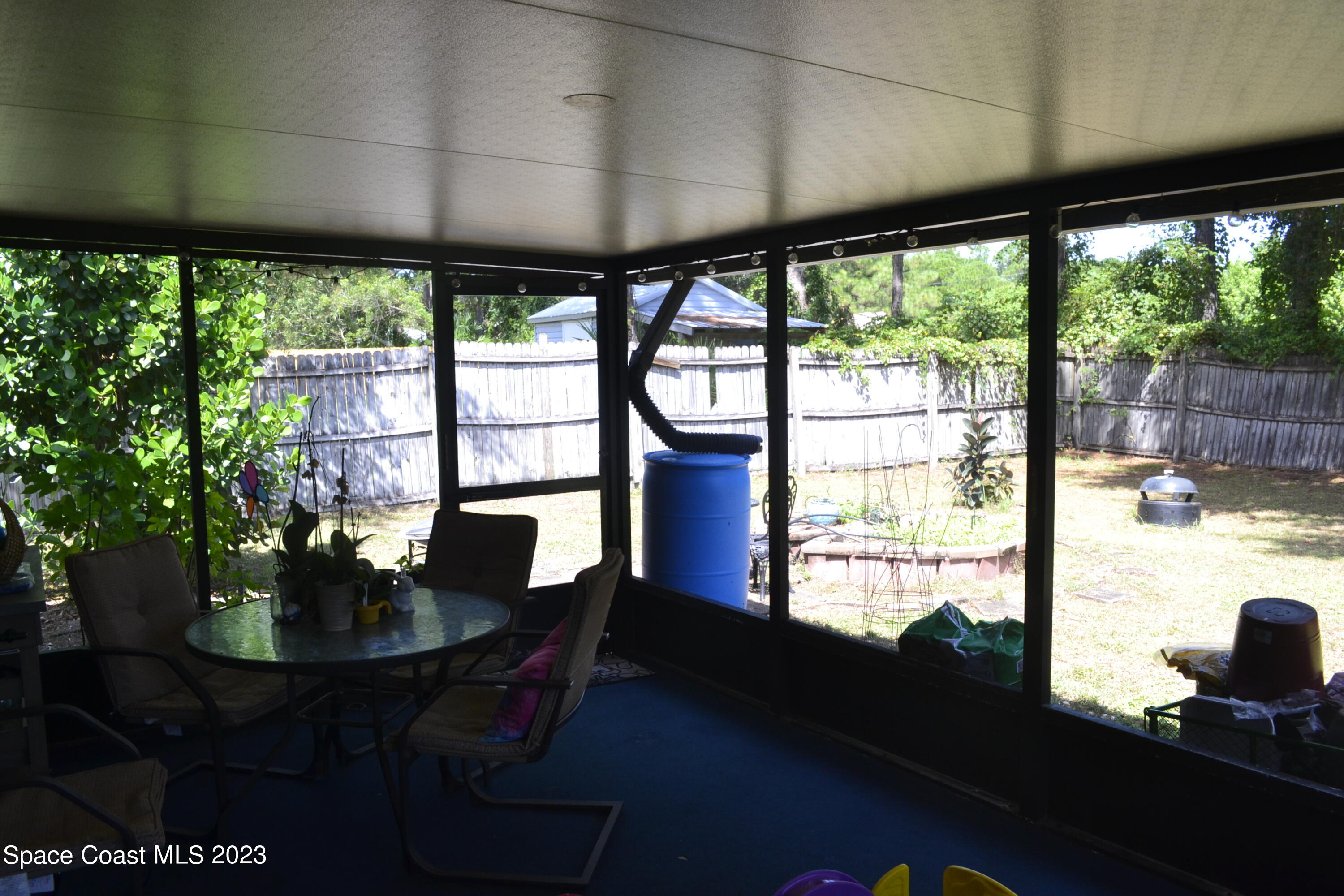 3910 Delespine Road Cocoa, FL 32927 - Photo 19 of 21 a view of a dining room with furniture window and outside view