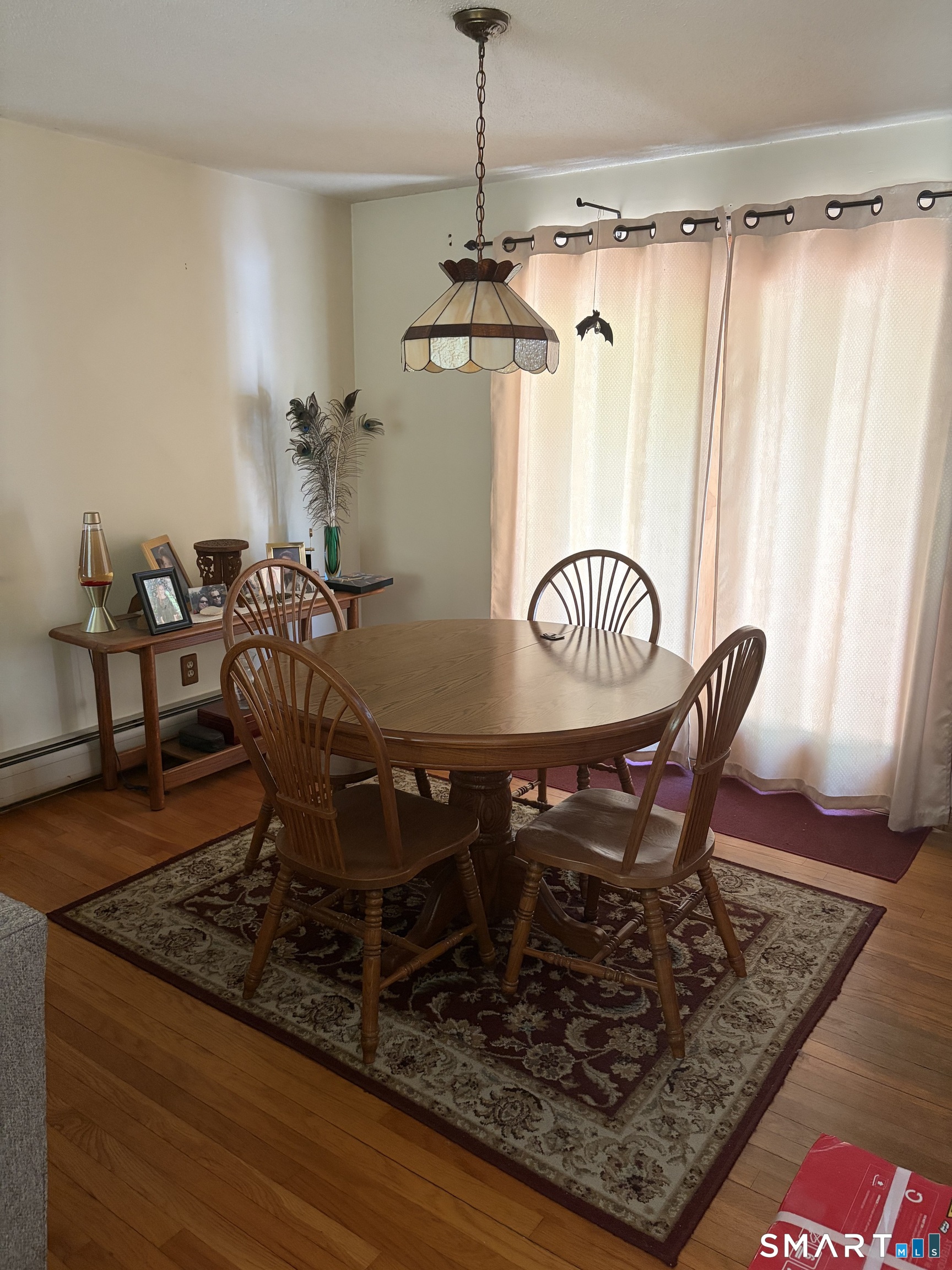 109 Village Hill Road Willington, CT 06279 - Photo 22 of 22 a dining room with a table and chairs