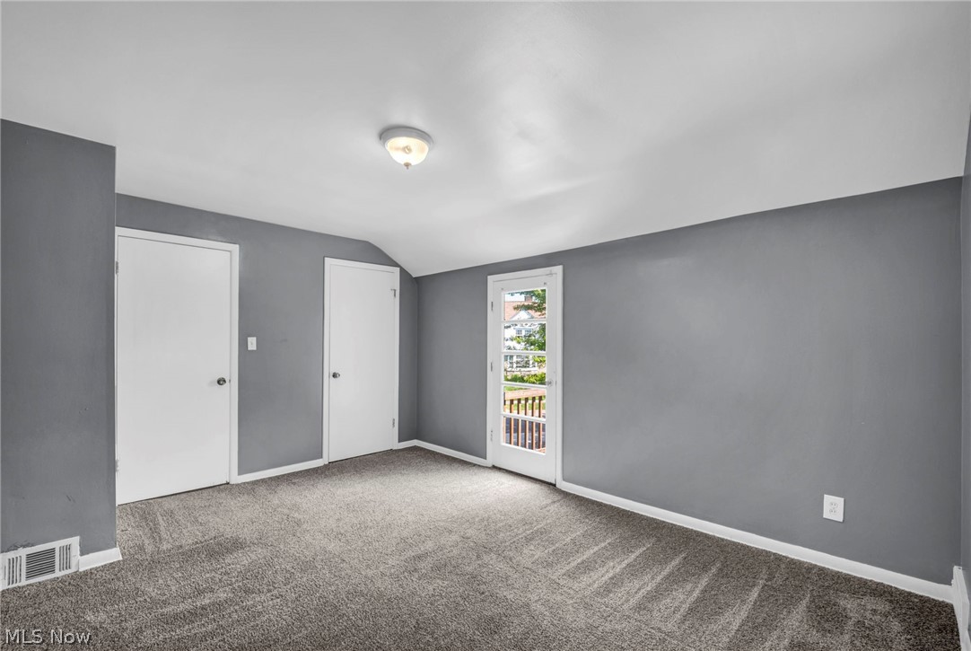 2313 North Taylor Road Cleveland Heights, OH 44112 - Photo 12 of 32 Room featuring gray walls, gray patterned carpeting, and white trim