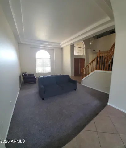 a kitchen with stainless steel appliances granite countertop a refrigerator and a stove