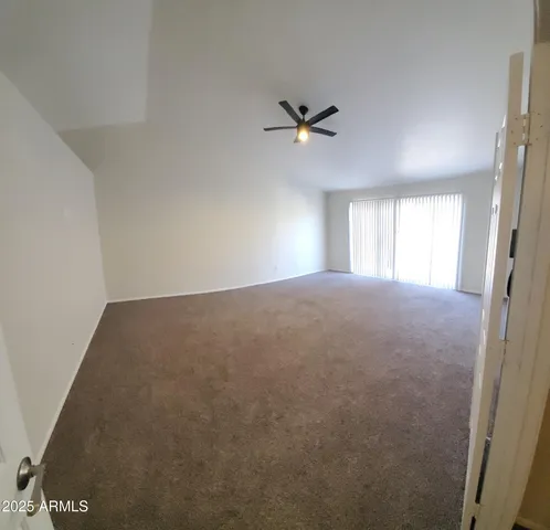 a view of a livingroom with a window