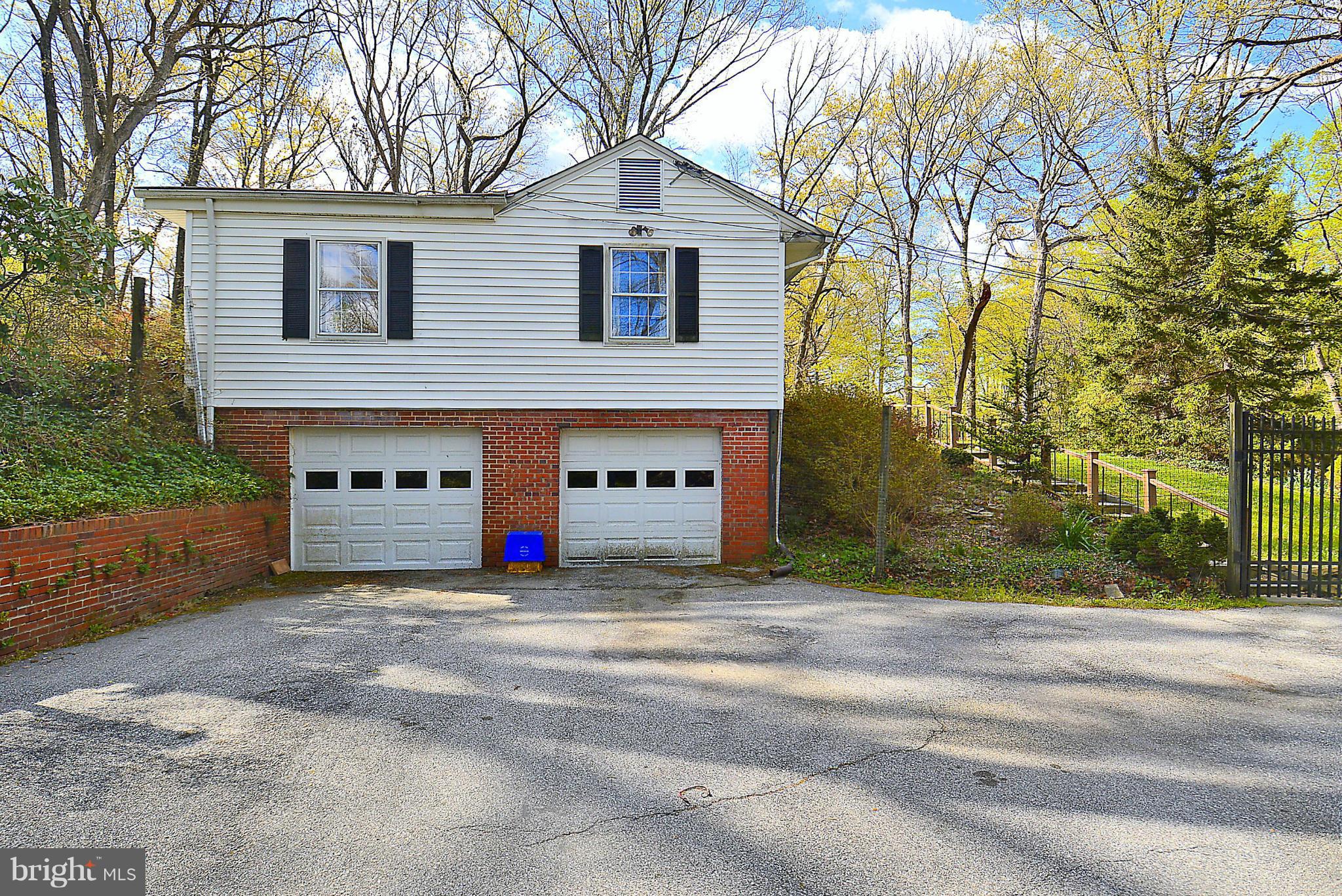 Parking Pad and 2-Car Garage