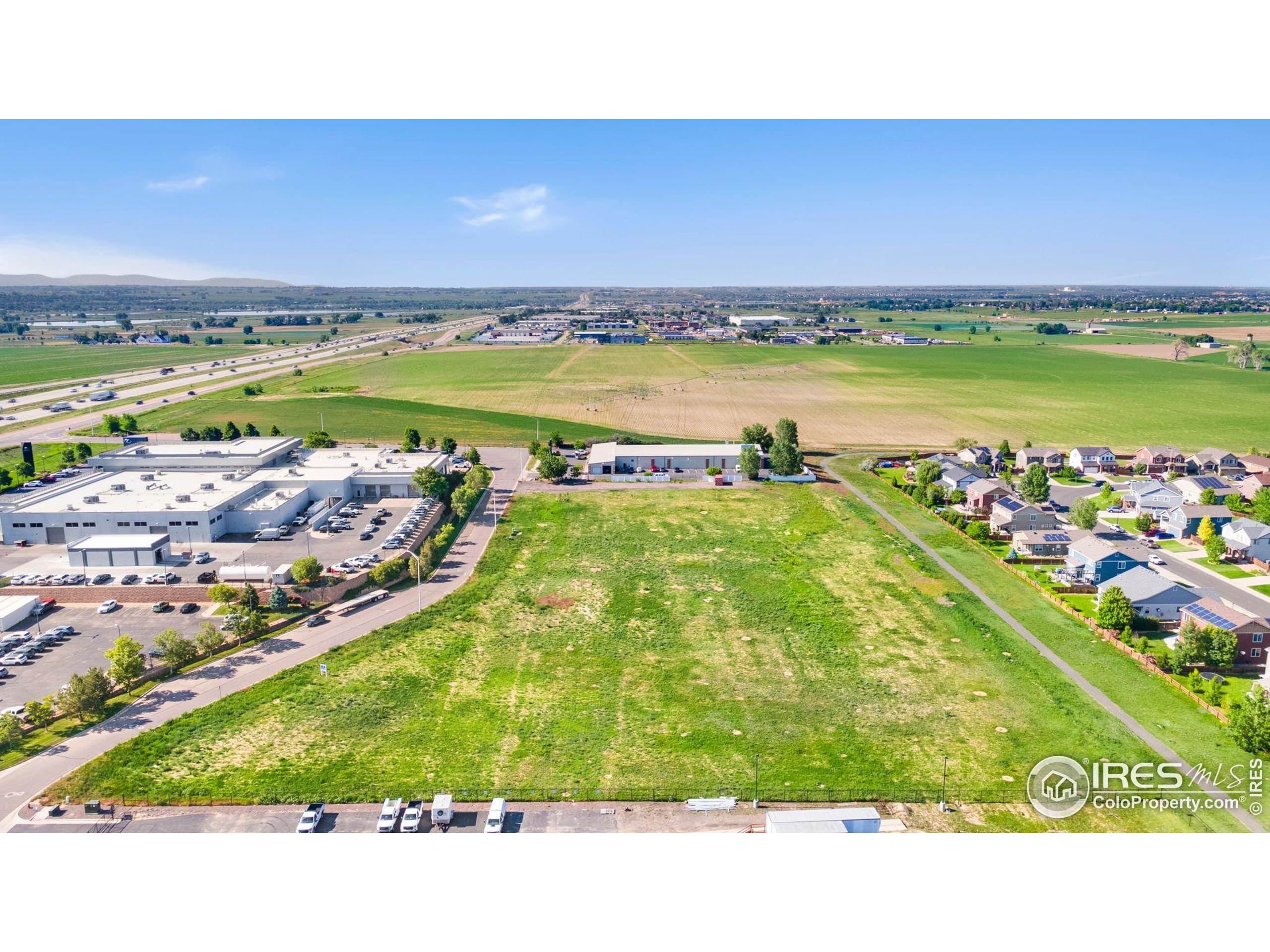 8360 Raspberry Way Frederick, CO 80504 - Photo 4 of 8 a view of an outdoor space and ocean view