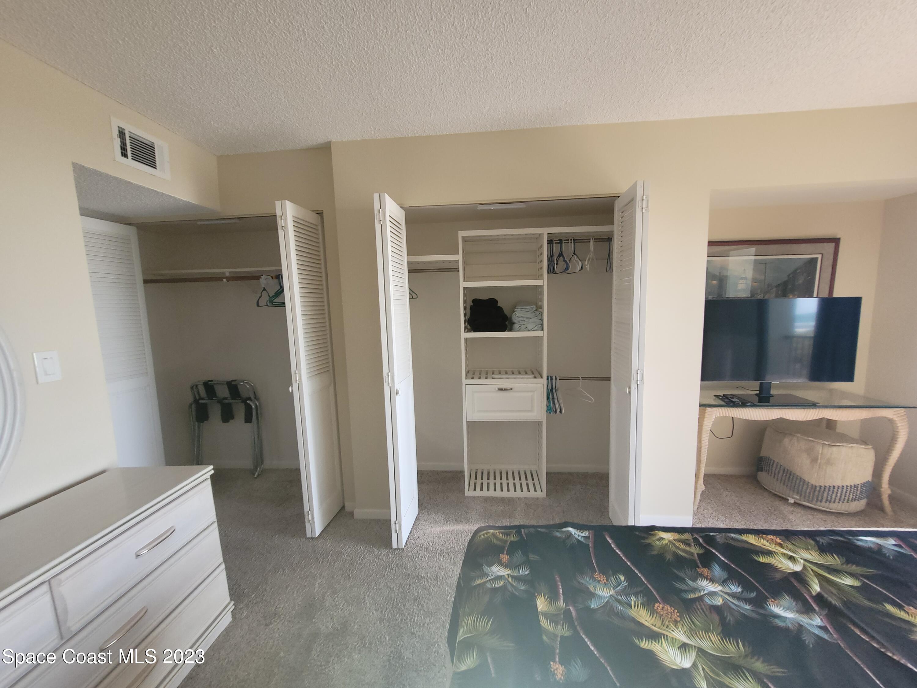 1251 South Atlantic Avenue, Unit 201 Cocoa Beach, FL 32931 - Photo 22 of 43 Master, large Closets