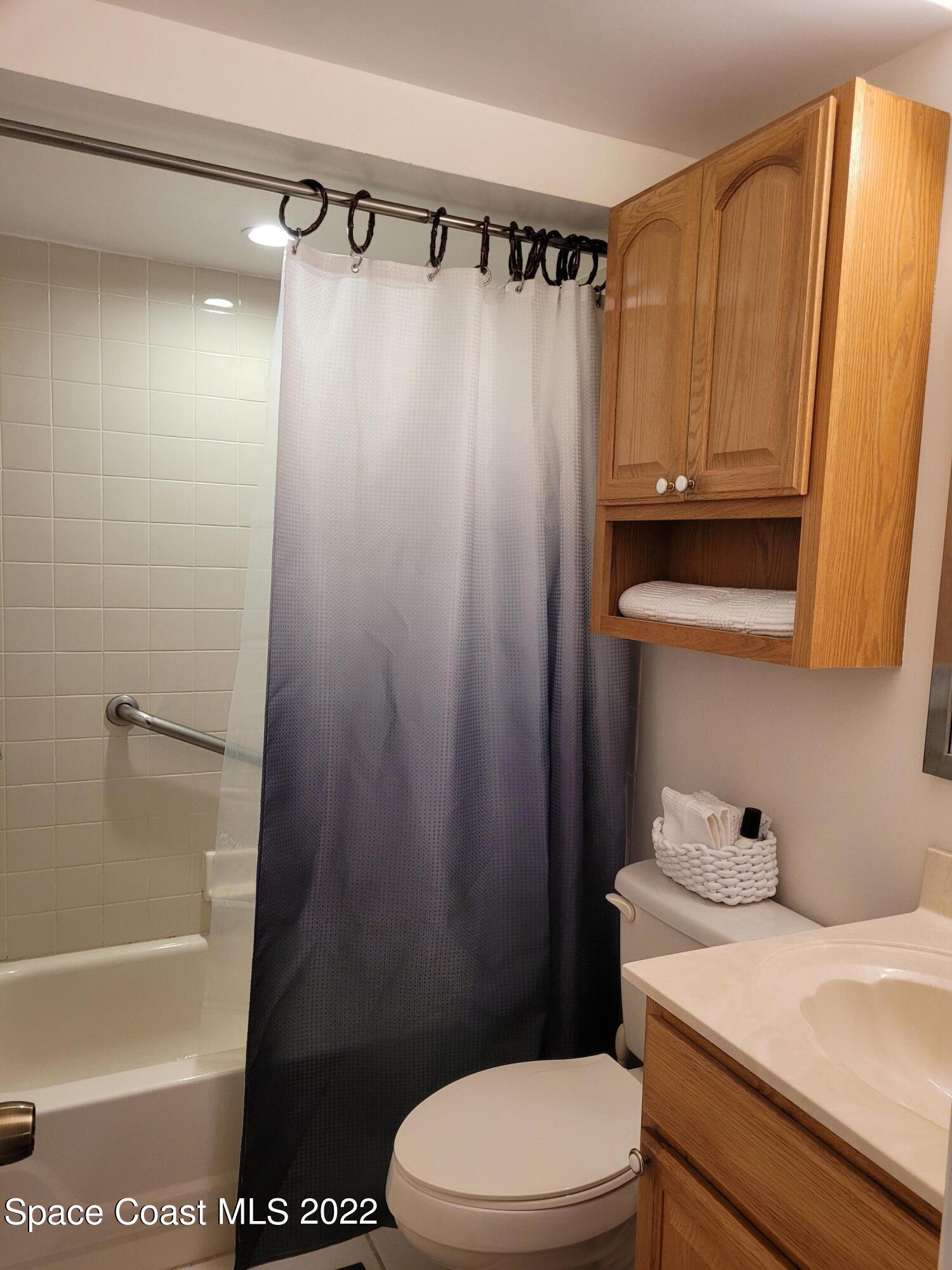 1251 South Atlantic Avenue, Unit 201 Cocoa Beach, FL 32931 - Photo 25 of 43 Master Bath with grab bar