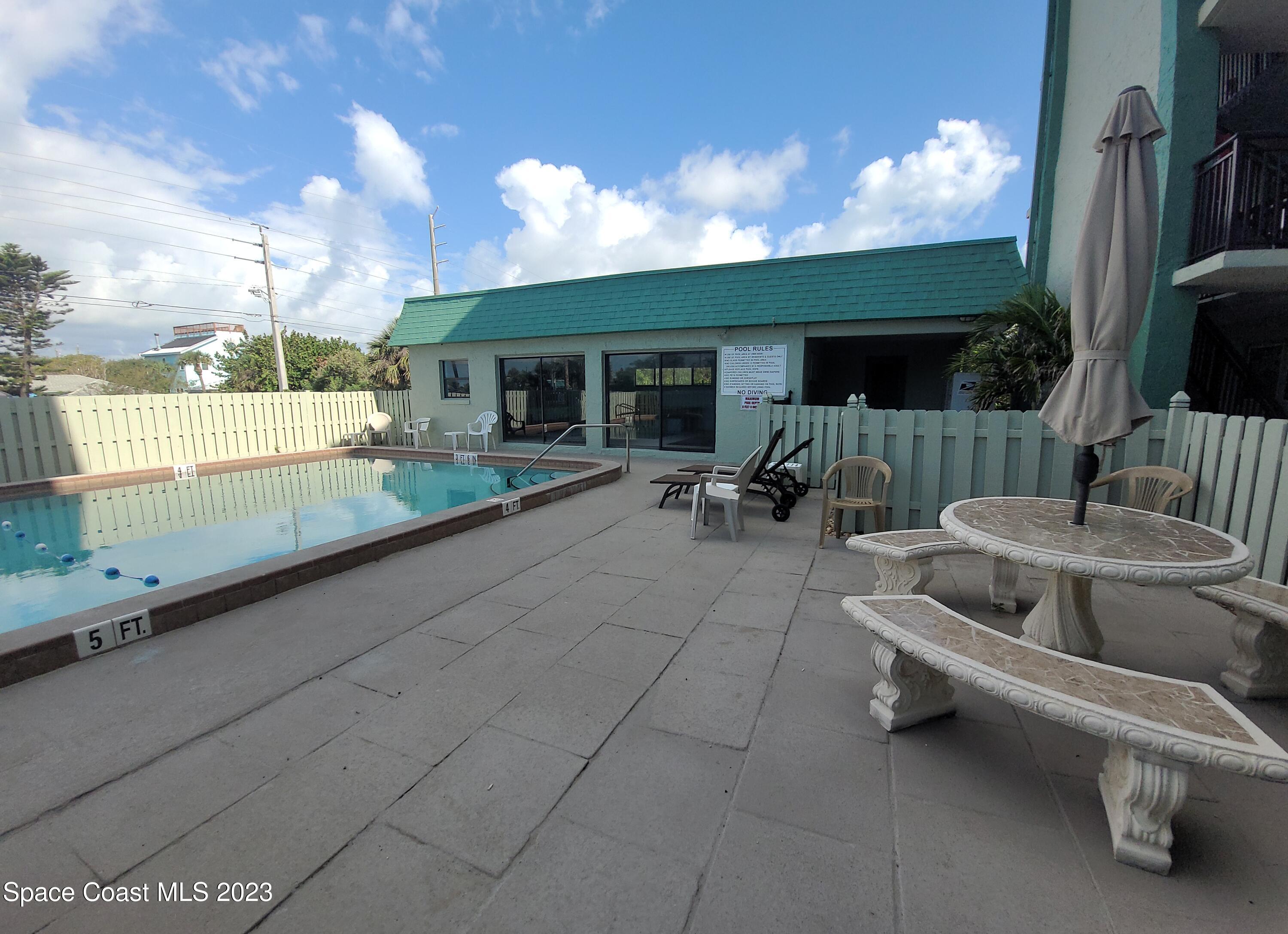 1251 South Atlantic Avenue, Unit 201 Cocoa Beach, FL 32931 - Photo 39 of 43 Beautiful Pool area