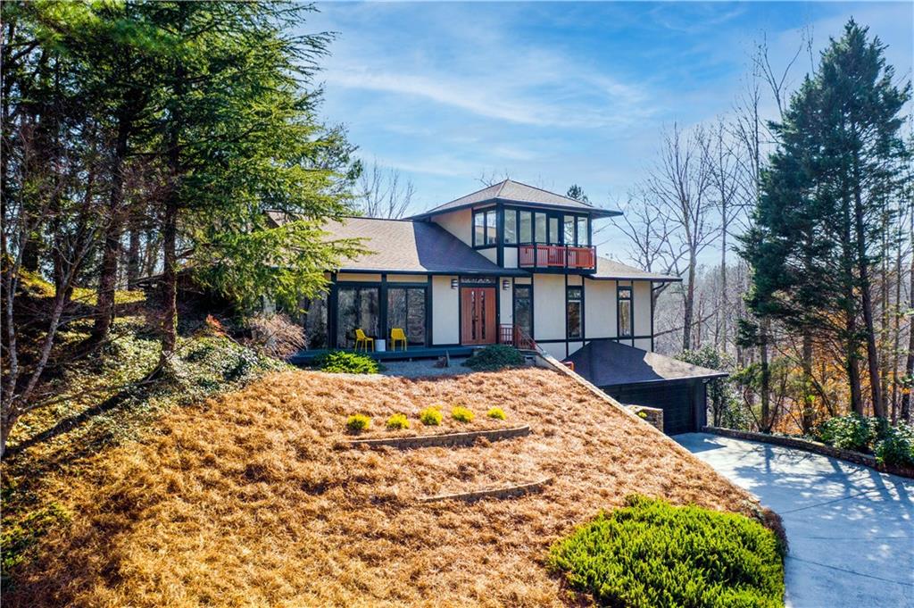 29 Wing Mill Road Sandy Springs, GA 30350 - Photo 1 of 1 a front view of a house with a yard