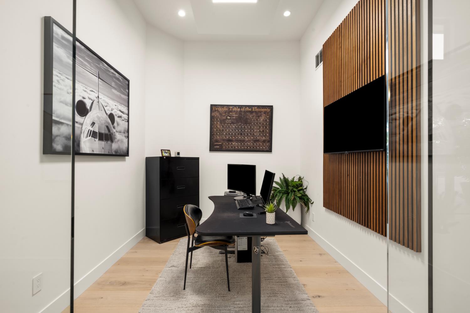 3630 Winding Creek Road Sacramento, CA 95864 - Photo 27 of 74 a workspace with furniture and a flat screen tv