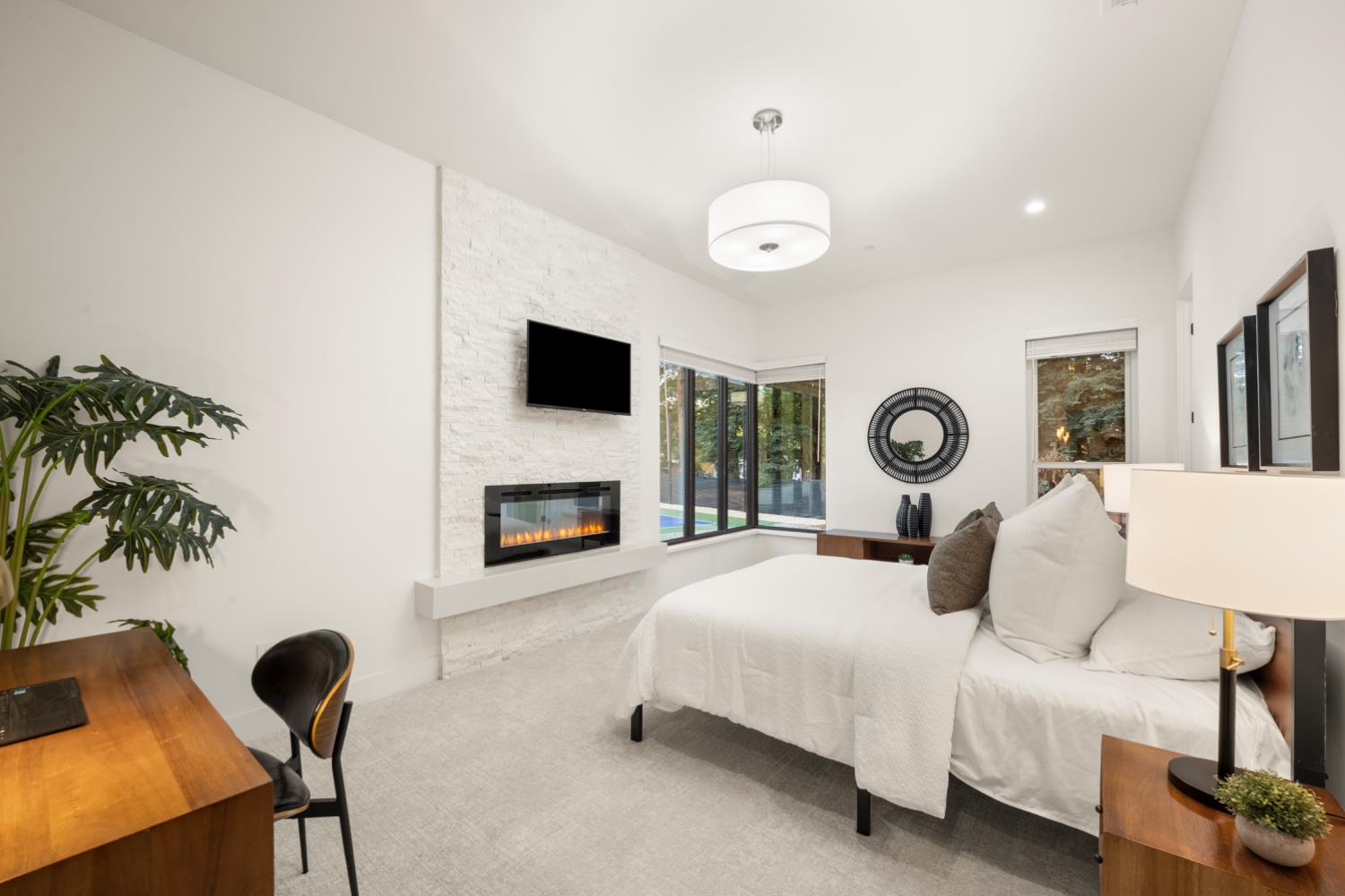 3630 Winding Creek Road Sacramento, CA 95864 - Photo 33 of 74 a bedroom with a bed and a fireplace