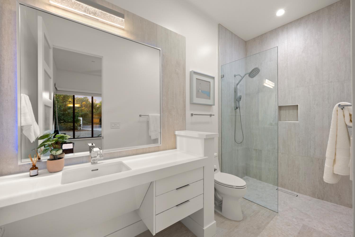 3630 Winding Creek Road Sacramento, CA 95864 - Photo 34 of 74 a bathroom with a sink a toilet and shower
