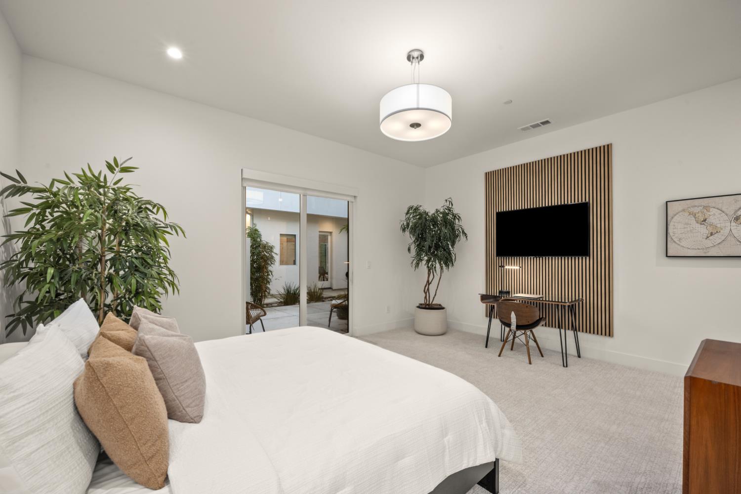 3630 Winding Creek Road Sacramento, CA 95864 - Photo 36 of 74 a bedroom with a bed and a flat screen tv