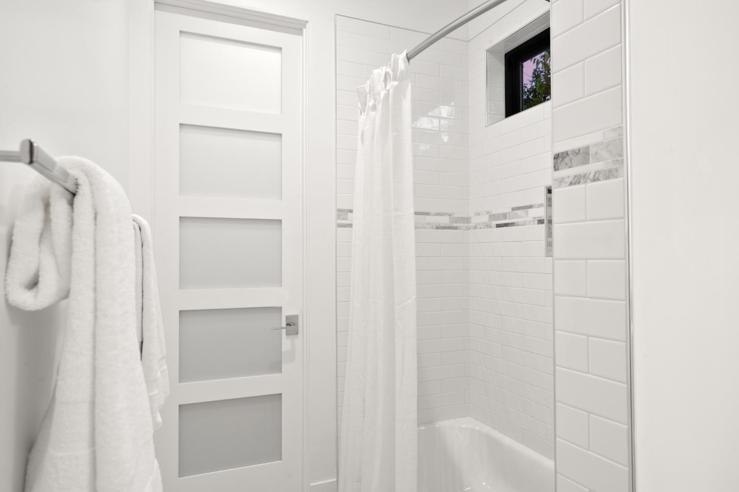 3630 Winding Creek Road Sacramento, CA 95864 - Photo 59 of 74 a bathroom with a shower and a glass door